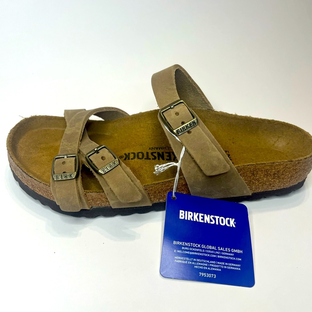 Left Birkenstock Tan Sandal